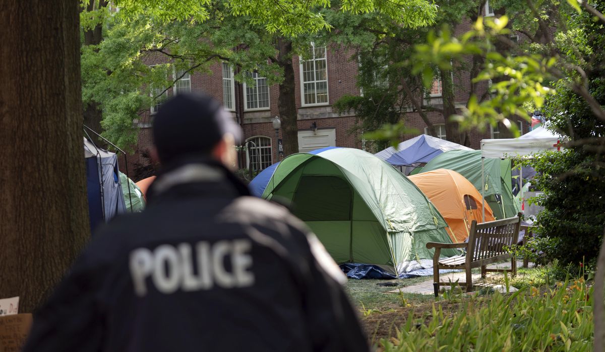 Anti-war student protesters dig in as faculty condemn universities' leadership over calling police