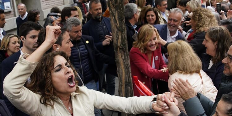 Thousands rally in Madrid to urge Spanish leader Pedro Sanchez not to resign