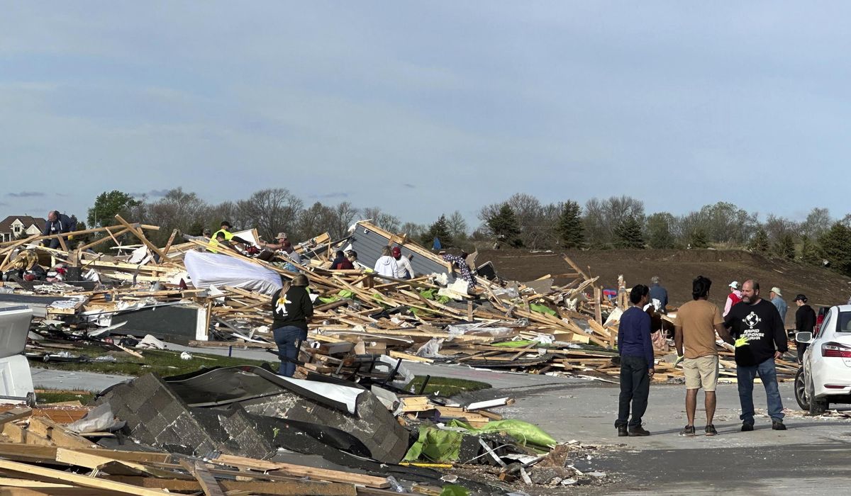 Residents begin going through rubble after tornadoes hammer parts of Nebraska and Iowa