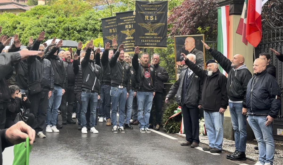 On the anniversary of Benito Mussolini's execution, dozens in Italy give a fascist salute