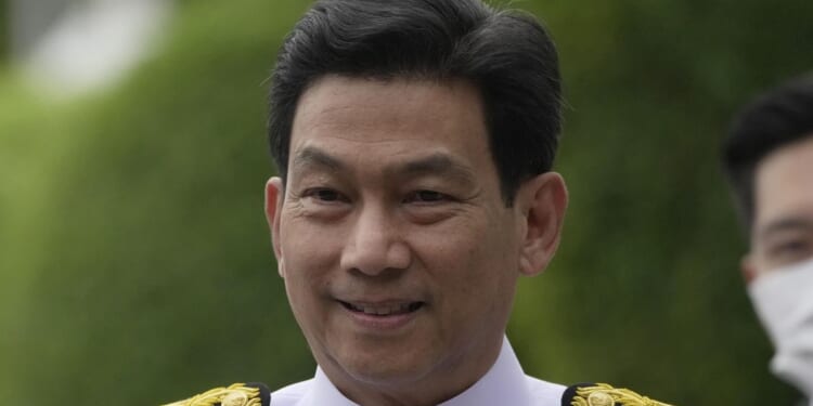 Thailand's F.M. Parnpree abruptly resigns after being dropped as deputy prime minister