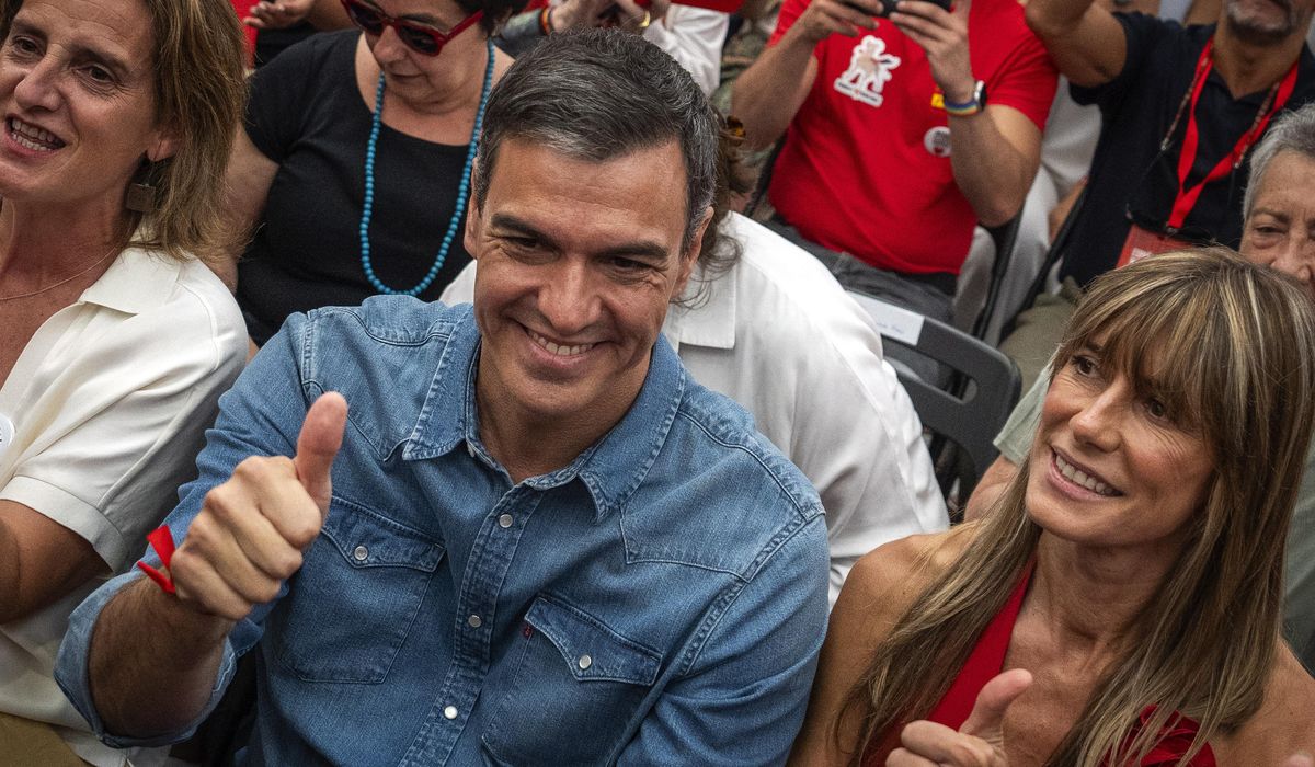 Spain's P.M. Pedro Sanchez says he'll continue in office after days of reflection