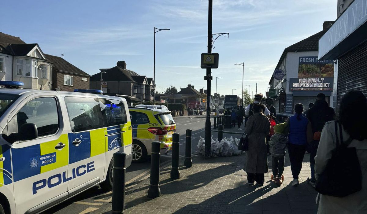 U.K. police arrest man wielding a sword in east London. 5 people are taken to the hospital