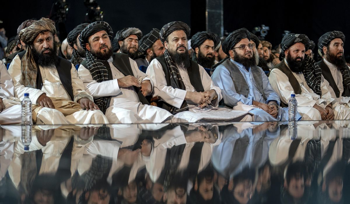 A gunman shoots six worshippers inside a Shiite mosque in western Afghanistan, the Taliban say