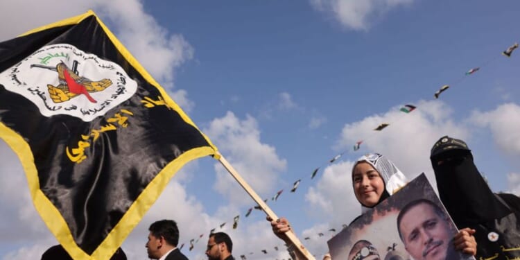 Supporters of the Islamic Jihad in Gaza City are shown.