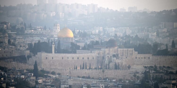 A panoramic view of Jerusalem's Old City is pictured at dawn Sunday, after Iran launched a drone and missile attack on Israel.