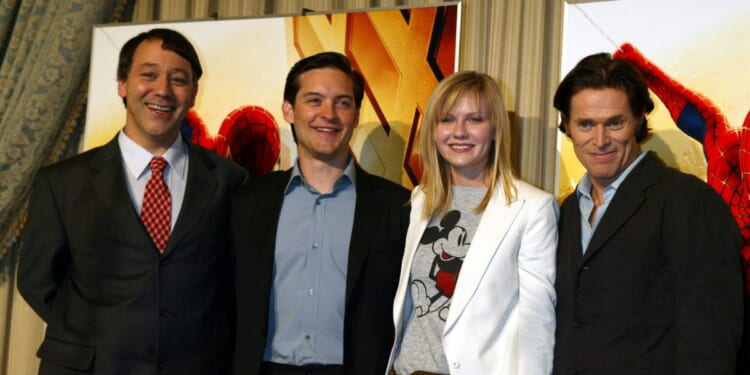 (L-R) Director Sam Raimi, actor Tobey Maguire, actress Kirsten Dunst and actor Willem Dafoe meet Japanese journalists at a press conference while promoting the new movie "Spider-Man" April 5, 2002 in Tokyo, Japan.