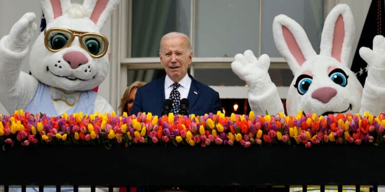 President Joe Biden address guests from the Truman Balcony during the White House Easter Egg Roll on the South Lawn of the White House in Washington, D.C, on Monday.