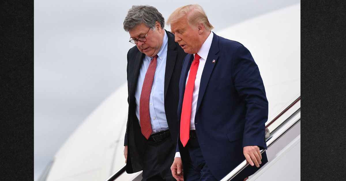 Then-President Donald Trump, right, and U.S. Attorney General William Barr are seen stepping off Air Force One upon arrival at Andrews Air Force Base in Maryland on September 1, 2020.