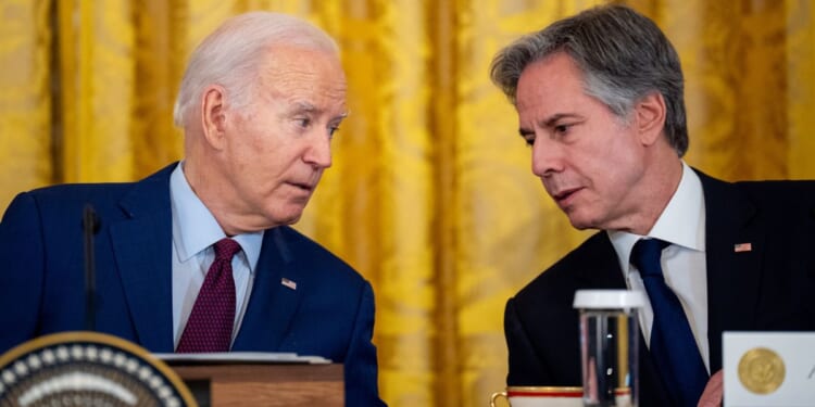 President Joe Biden, left, is seen speaking with Secretary of State Antony Blinken during a Thursday meeting with foreign dignitaries at the White House. Biden was called back to Washington, D.C., Saturday from his beach house in Delaware after reports that an attack on Israel by Iran is imminent.