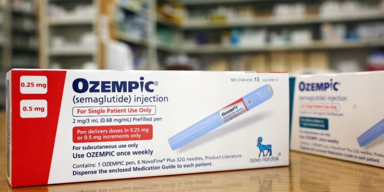 Boxes of the drug Ozempic rest on a pharmacy counter in Los Angeles on April 17, 2023.