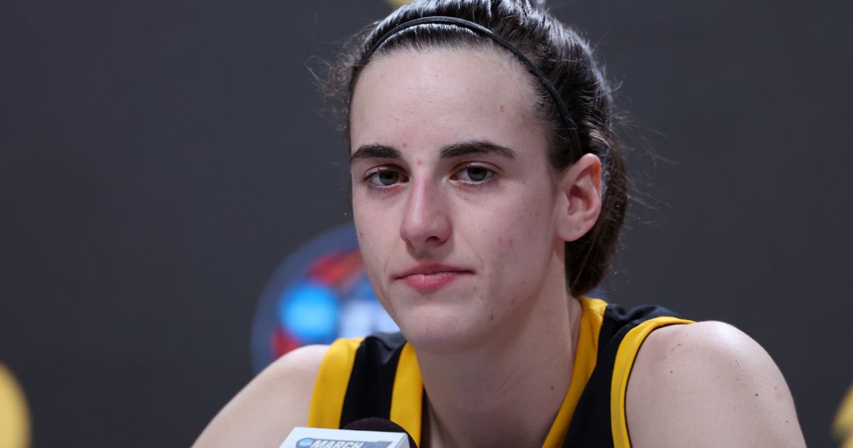 Caitlin Clark of the Iowa Hawkeyes speaks with the media after losing to the South Carolina Gamecocks in the 2024 NCAA Women's Basketball Tournament National Championship in Cleveland, Ohio, on Sunday.