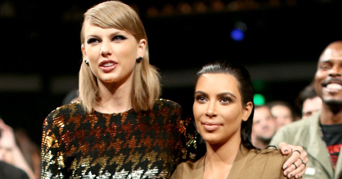 Taylor Swift, left, and Kim Kardashian, right, attend the 2015 MTV Video Music Awards in Los Angeles, California, on Aug. 30,