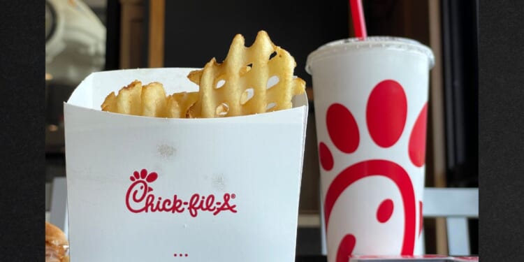 A Chick-fil-A meal is displayed at a Chick-fil-A restaurant in this file photo from June 2023. The fast food chain has plans to demolish a Portland strip club to build its first restaurant in the city.