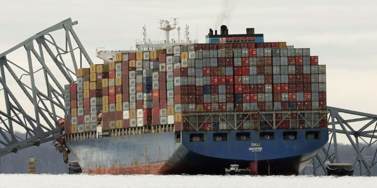 The cargo ship Dali sits in the water after running into and collapsing the Francis Scott Key Bridge in Baltimore, Maryland, on March 26.