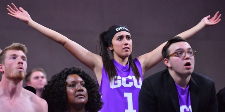 Grand Canyon Lopes fans cheer during a semifinal game of the Western Athletic Conference basketball tournament between the Lopes and Utah Valley Wolverines at the Orleans Arena on March 9, 2018 in Las Vegas, Nevada.