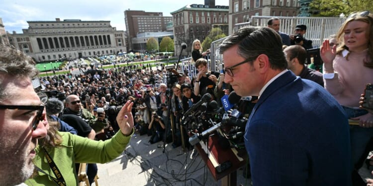 House Speaker Mike Johnson takes questions from reporters after meeting with Jewish students as anti-Israel students and activists stage a protest on the campus of Columbia University in New York City on Wednesday.