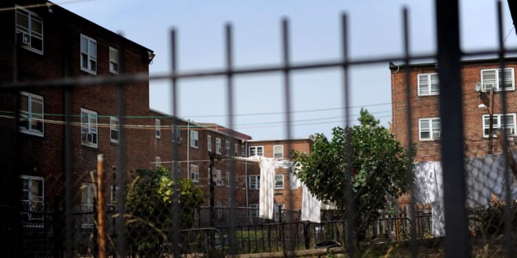 Laundry hangs outside a public housing complex in the Northwest section of Washington on Aug. 26, 2008.