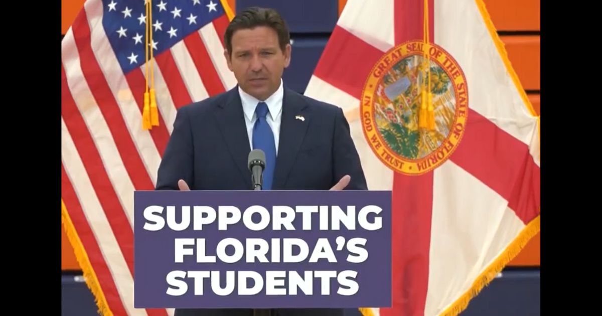 Florida Gov. Ron DeSantis speaks at a news conference in Kissimmee, Florida, at Tohopekaliga High School.