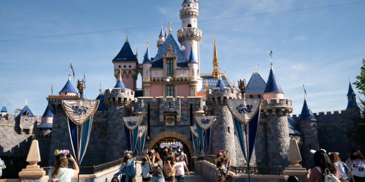 Visitors pass through Disneyland in Anaheim, California.