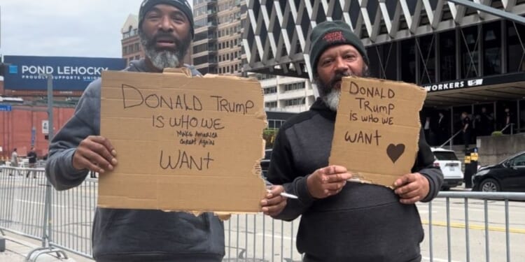 People gather to greet President Joe Biden in Pittsburgh on Wednesday.