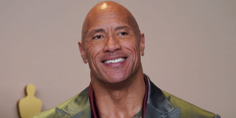 Dwayne "The Rock" Johnson poses in the press room at the Oscars on March 10 in Los Angeles.