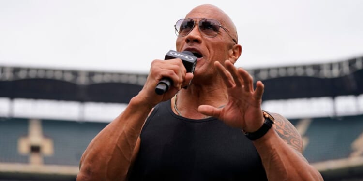 Dwayne Johnson speaks prior to a UFL game between the Birmingham Stallions and Arlington Renegades at Choctaw Stadium in Arlington, Texas, on Saturday.