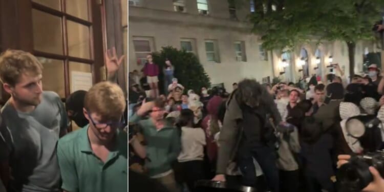 As pro-Hamas protesters, right, at Columbia University attempted to gain access to Hamilton Hall on campus on Monday, the grandson of Doug Wilson and his friend, left, blocked the door for as long as they could.