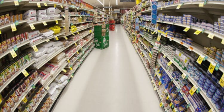 An aisle of a grocery store is shown in this stock photo. Meanwhile, supermarket chain Harris Teeter is implementing new security measures at its Washington, D.C., stores.