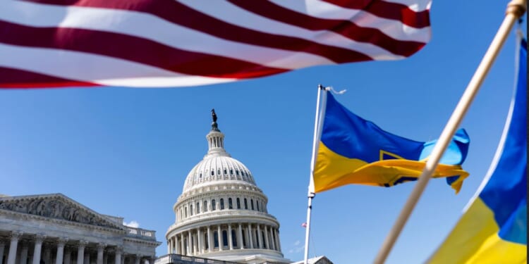 American and Ukrainian flags fly near the U.S. Capitol Saturday in Washington, D.C., after the House passed a $95 billion foreign aid package for Ukraine, Israel and Taiwan.