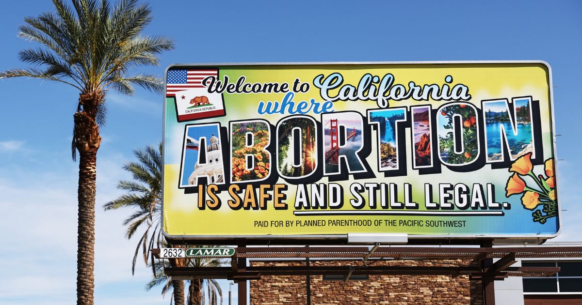 A billboard reads, "Welcome to California where abortion is safe and still legal" on July 12, 2022 in Rancho Mirage, California.