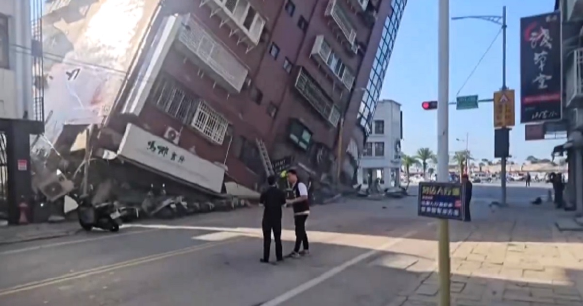 A building tilts to the point of collapse Wednesday in Hualien, Taiwan, after a powerful earthquake struck the country.