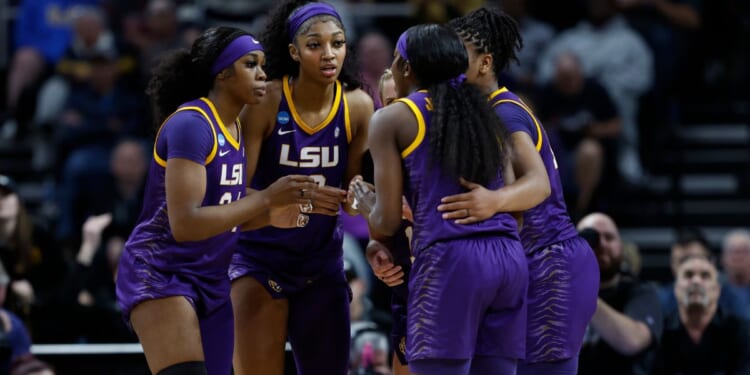 The LSU Tigers huddle during the first half against the Iowa Hawkeyes in the Elite 8 round of the NCAA Women's Basketball Tournament in Albany, New York, on Monday.