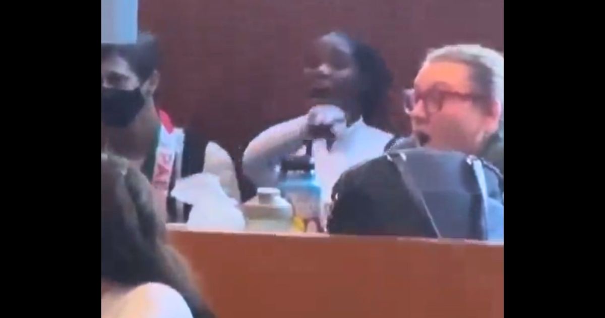 A woman identified as Loyola Marymount University graduate student Grace Obi-Azuike yells at Jewish people.