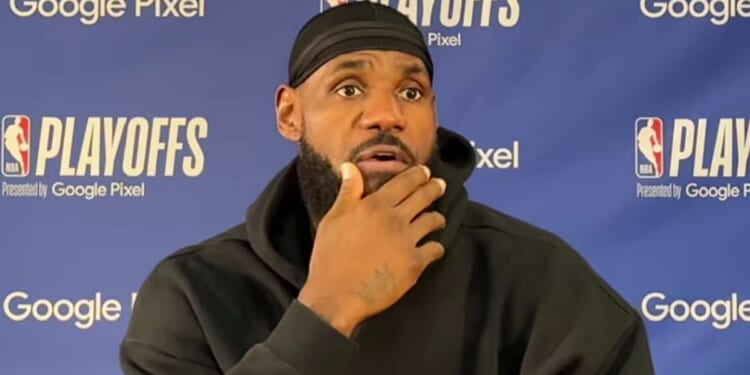 LeBron James of the Los Angeles Lakers answers questions at a post-game news conference on Monday.