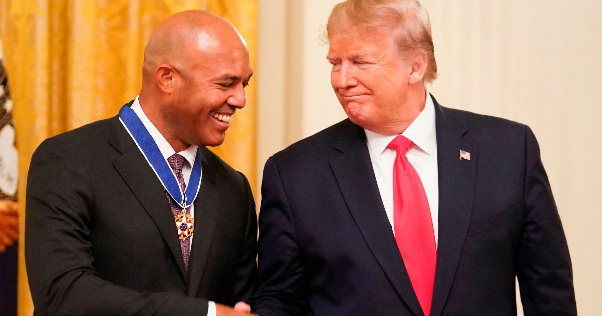 Then-President Donald Trump shakes hands with former New York Yankees pitcher Mariano Rivera after presenting him with the Medal of Freedom in the East Room of the White House in Washington, D.C., on Sept. 16, 2019.