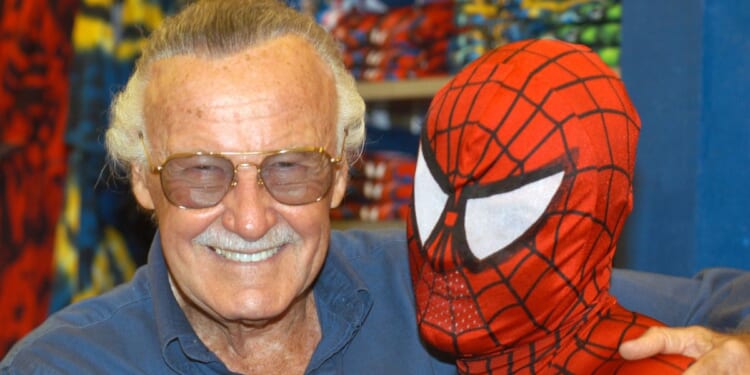 Creator Stan Lee (L) poses with Spider-Man during the Spider-Man 40th Birthday celebration at Universal Studios on August 13, 2002 in Universal City, California.