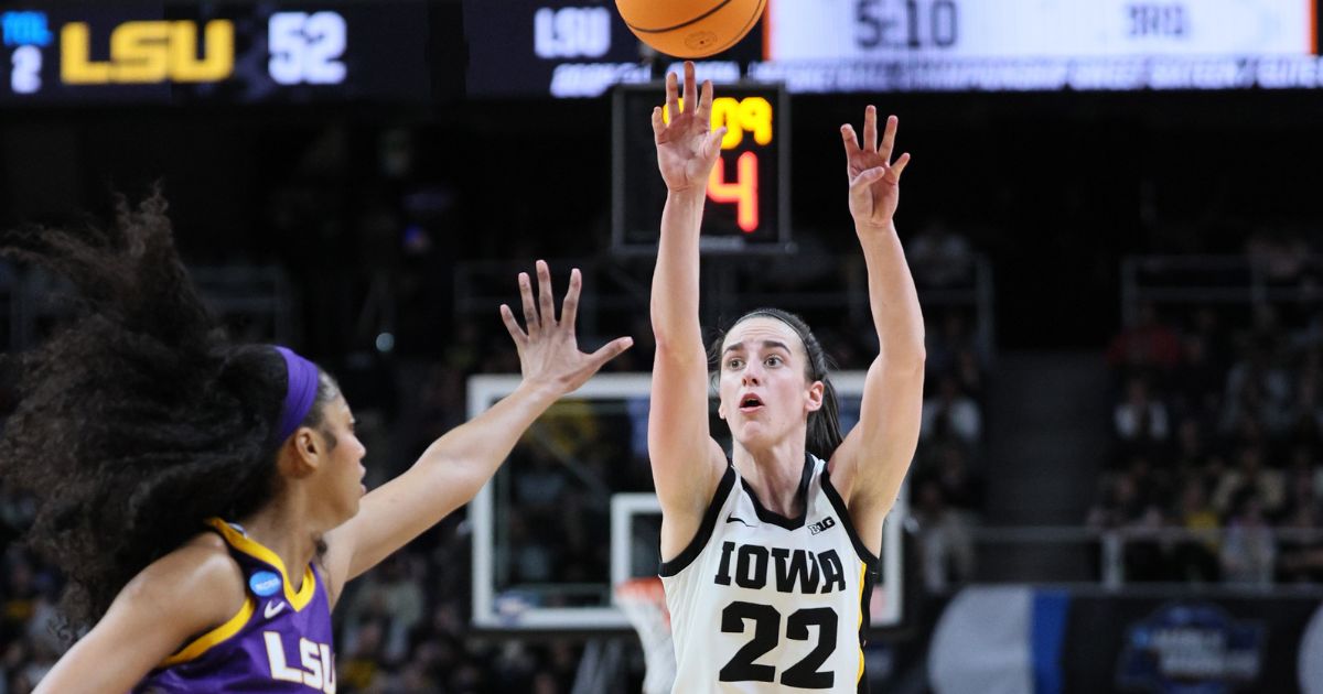 Caitlin Clark of the Iowa Hawkeyes shoots a 3-pointer in front of Angel Reese of the LSU Tigers during the second half of their NCAA Tournament game at MVP Arena in Albany, New York, on Monday.