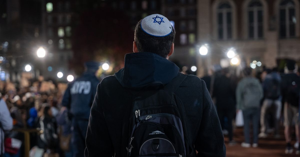 A Jewish student watches a pro-Palestinian demonstration on the Columbia University campus in New York on Nov. 14.