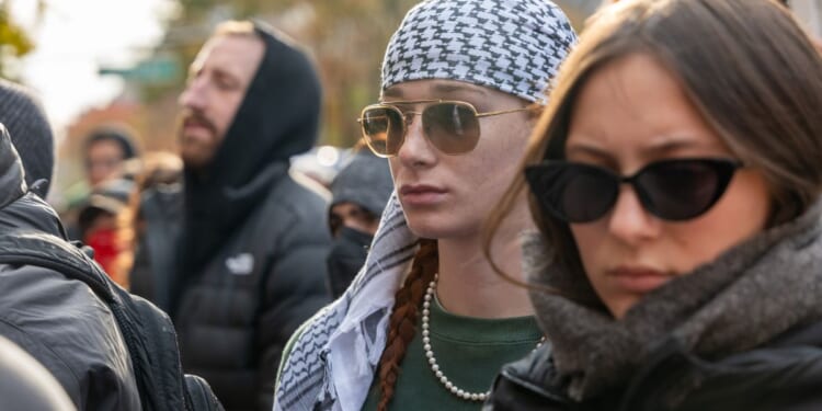 Students participate in a protest in support of Palestine outside of the Columbia University campus in New York City on Nov. 15.