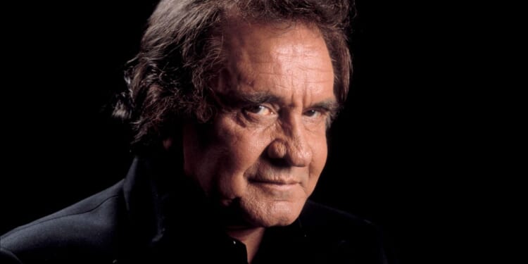 Johnny Cash poses for a portrait at the Star Plaza Theater in Merrillville, Indiana, on May 2, 1994.