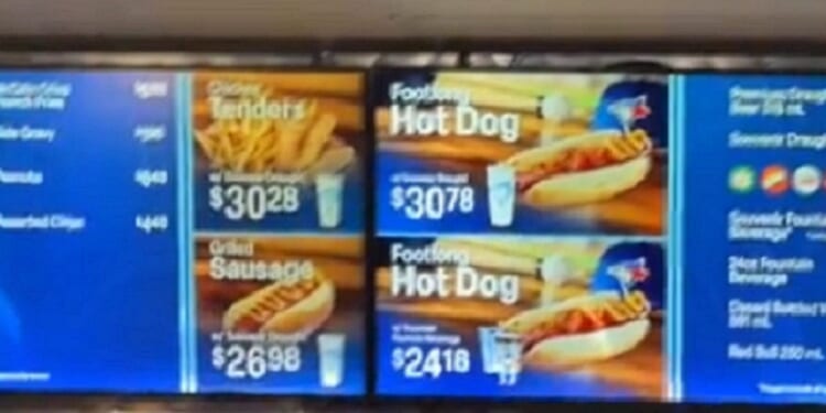 Concession stand prices show a hot dog and beer combo going for abotu $30 in Canadian currency.