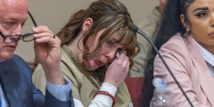 Hannah Gutierrez-Reed wipes her tears at her sentencing hearing in state district court in Santa Fe, New Mexico, on Monday.