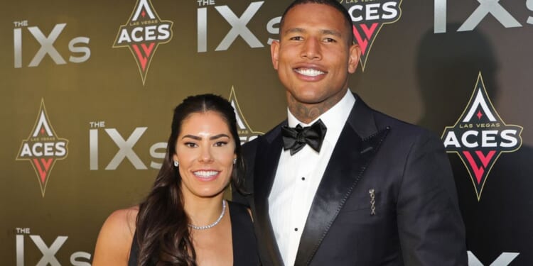 WNBA player Kelsey Plum of the Las Vegas Aces, left, and tight end Darren Waller then of the Las Vegas Raiders, right, attend the inaugural IX Awards in Las Vegas on June 17, 2022.