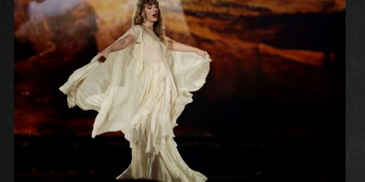 Taylor Swift, pictured during a March 2 concert in Singapore, sings lyrics comparing herself to Christ in her newest album.