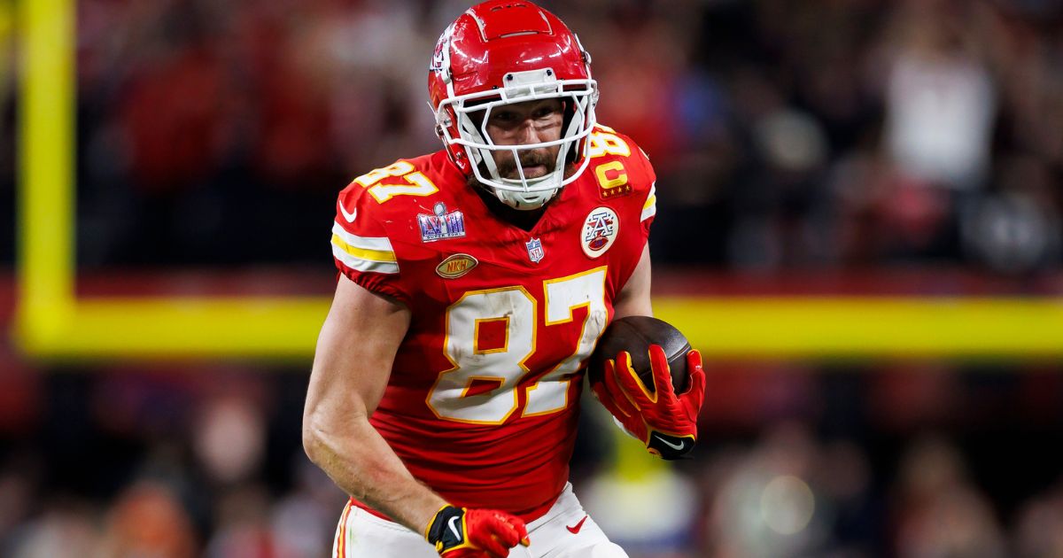 Travis Kelce of the Kansas City Chiefs runs the ball after a catch during Super Bowl LVIII against the San Francisco 49ers in Las Vegas, Nevada, on Feb. 11.