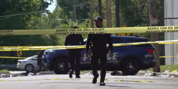 Police work the scene of a Saturday night shooting in Memphis, Tennessee.