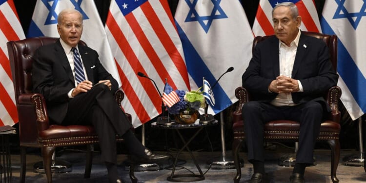 President Joe Biden meets with Israeli Prime Minister Benjamin Netanyahu in Tel Aviv on Oct. 18.