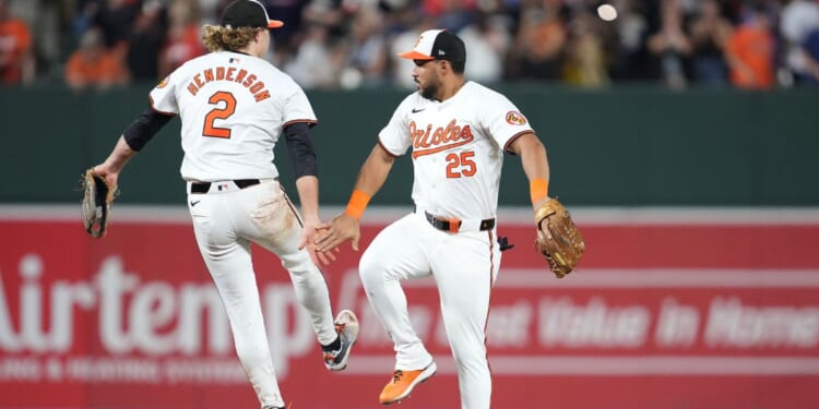 Gunnar Henderson and Anthony Santander of the Baltimore Orioles celebrate a win over the rival New York Yankees at Oriole Park at Camden Yards on Monday.