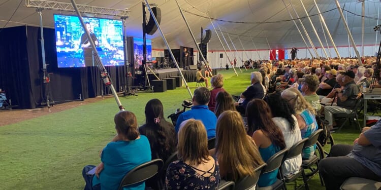 Evangelist Mario Murillo speaks during the Living Proof Crusade at the Arizona State Fairgrounds in Phoenix on Sunday.